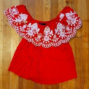 Red off the shoulder shirt
